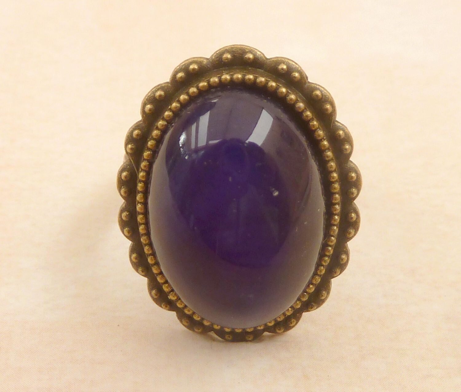 Eleganter Edelstein Ring mit Lapis Lazuli Cabochon bronzefarben Einzelstück
