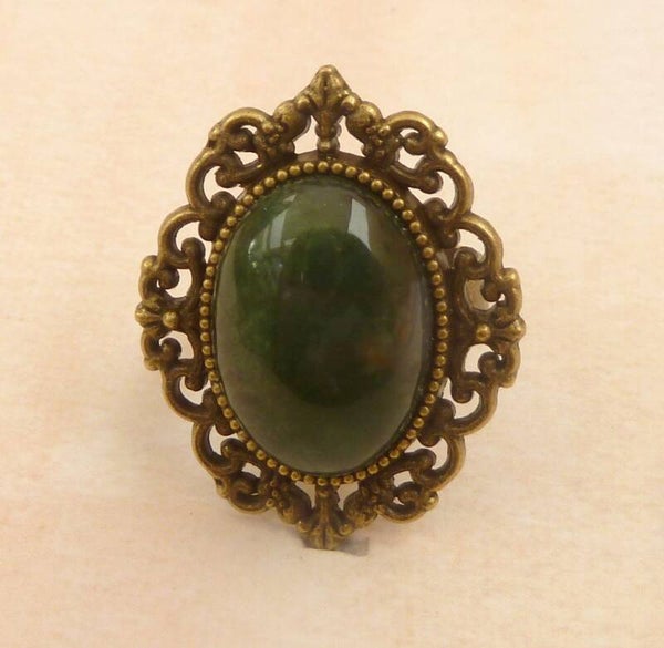 Eleganter Edelstein Ring mit Jade Cabochon bronzefarben Einzelstück