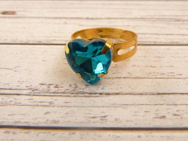 Edler Ring türkis goldfarben mit Herz Glasjuwel