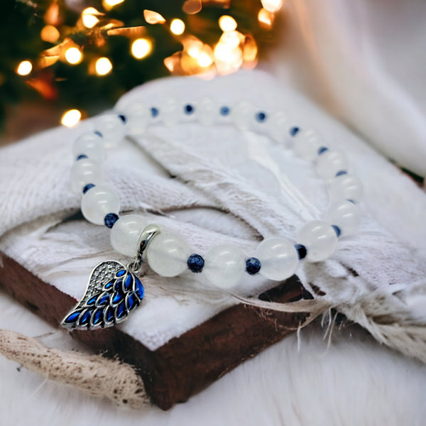 Moonstone and sapphire beads bracelet with an angel wing charm