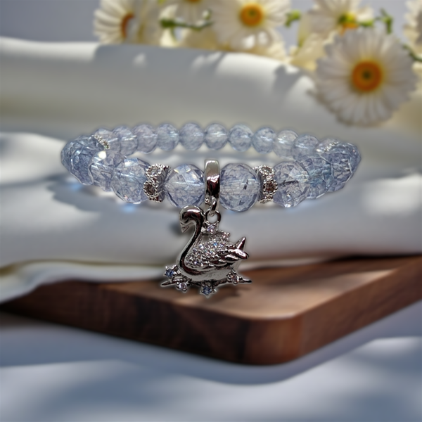 Blue topaz 8mm handmade beads bracelet with sterling silver swan charm