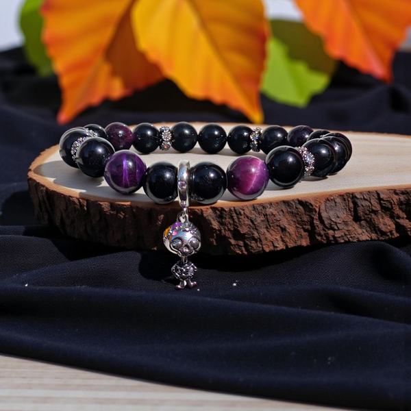 Tourmaline and tiger's eye beads bracelet with sterling silver skeleton charm