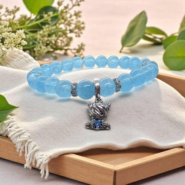 Handmade aquamarine beads bracelet with sterling silver highland cow charm