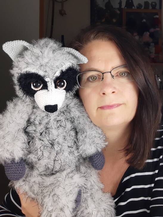 Claudia with Gene the Raccoon