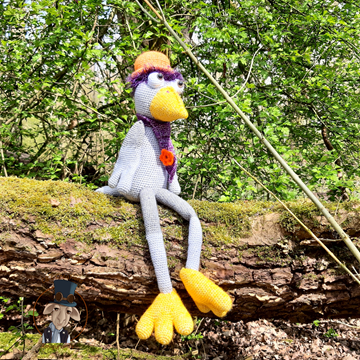 Forest with crocheted bird