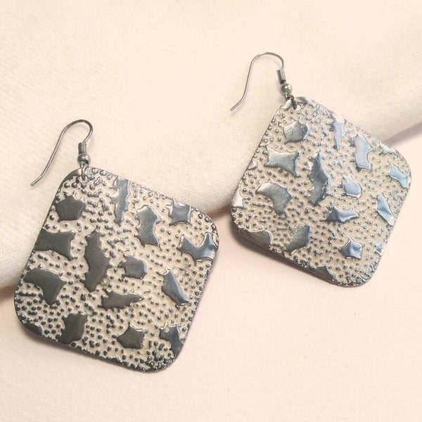 Outlet - Zilveren leopard oorstekers