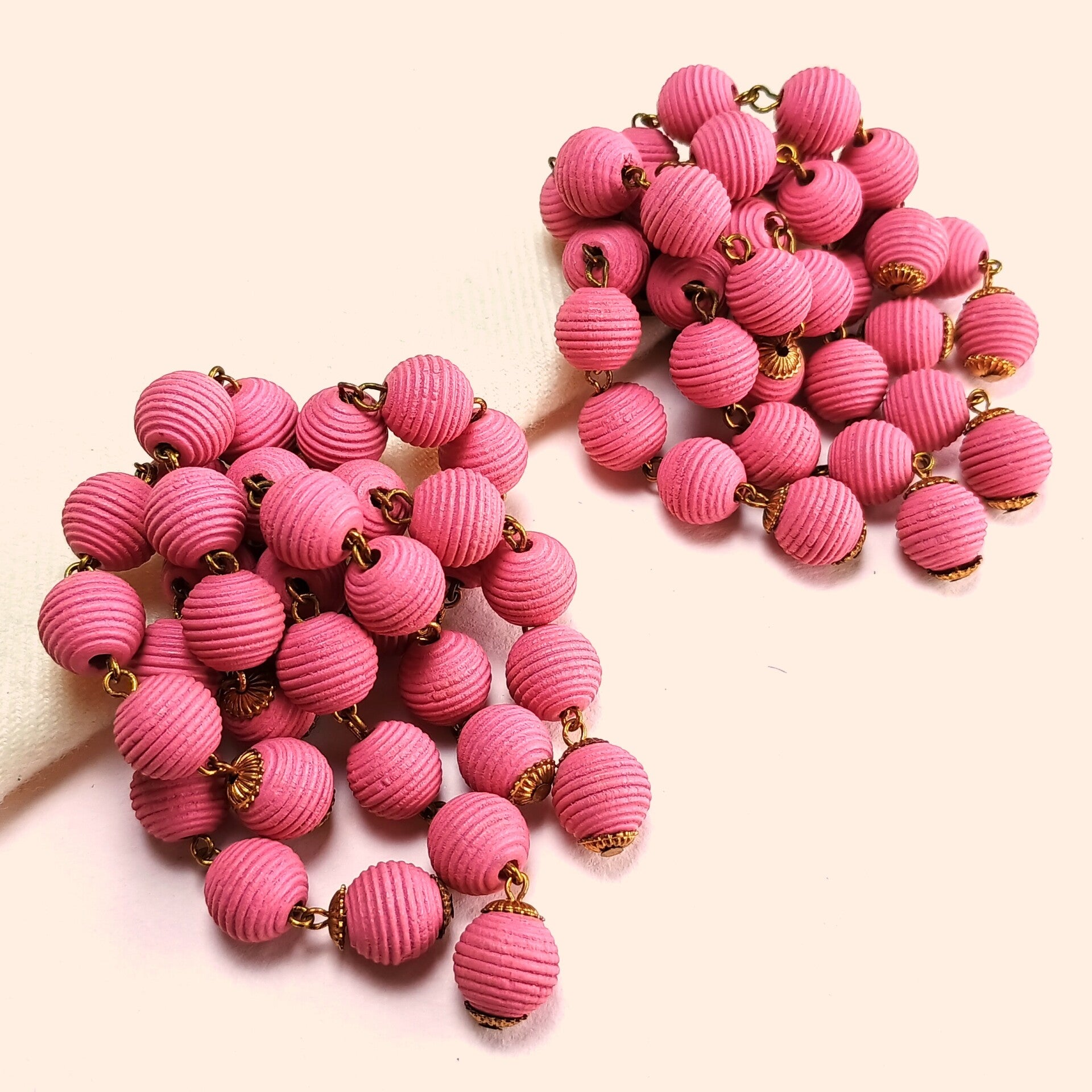 Roze kralen oorbellen 80s