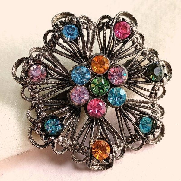 Bonte bloem broche 60s
