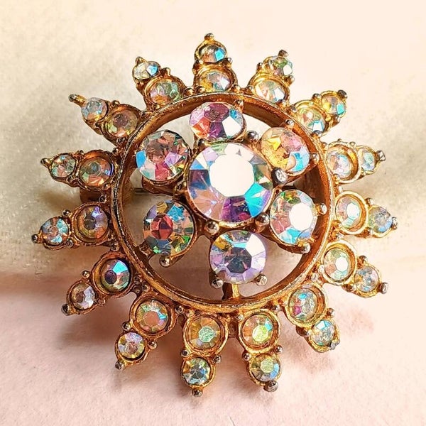 Aurora borealis zon broche 60s