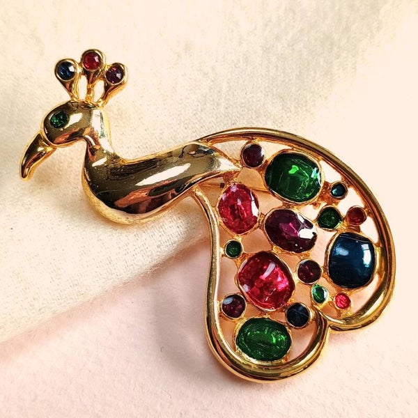 Vergulde emaille pauw broche 80s