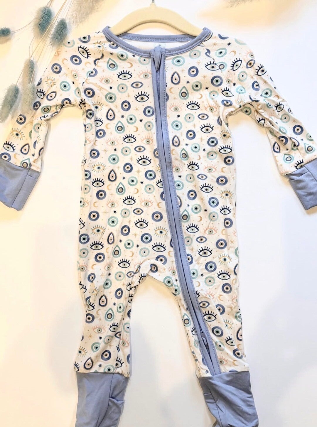 EVIL EYE ONESIE