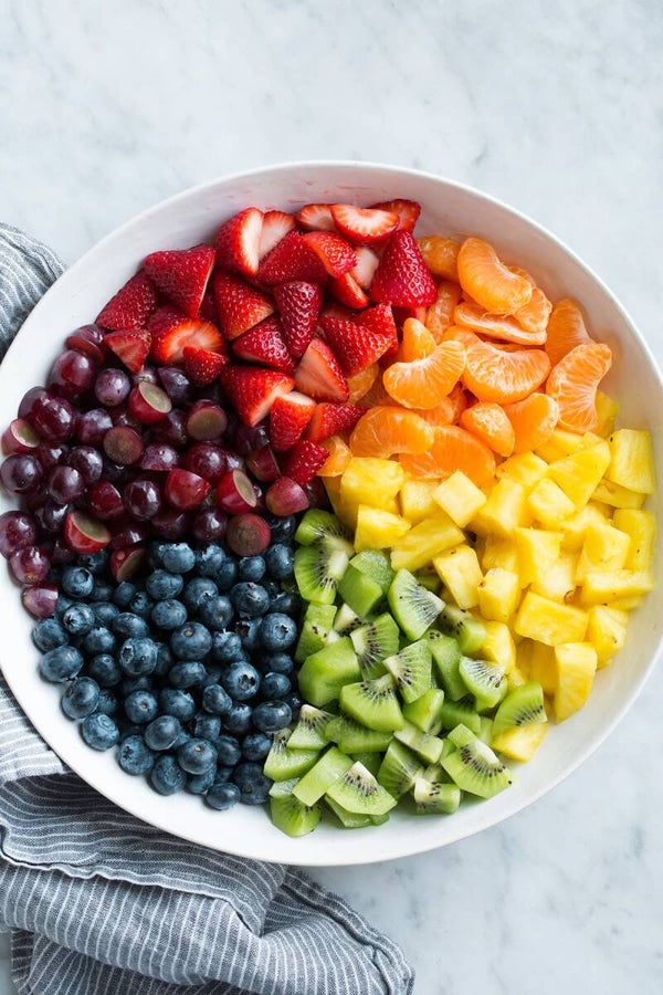 Fresh strawberries, mandarin oranges, pineapple, kiwi, blueberries,