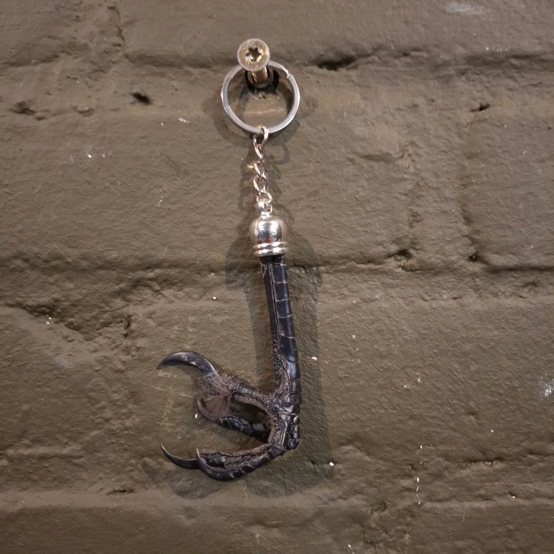 kraaien poot sleutelhanger