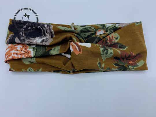 Soepele elastische haarband met twist in tricot, bloemenprint, ondergrond cider kleur  (art.nr. 58-05