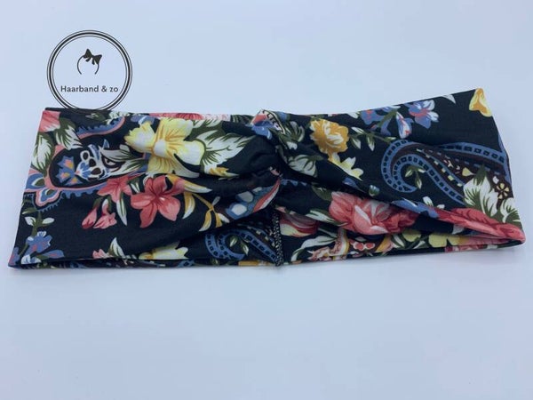 Elastische haarband met twist in bloemenprint, ondergrond zwart (art.nr 114-03)