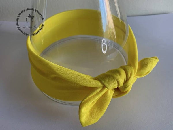 Basic elastische babyhaarband met strikje, geel (art.nr. 116-02)