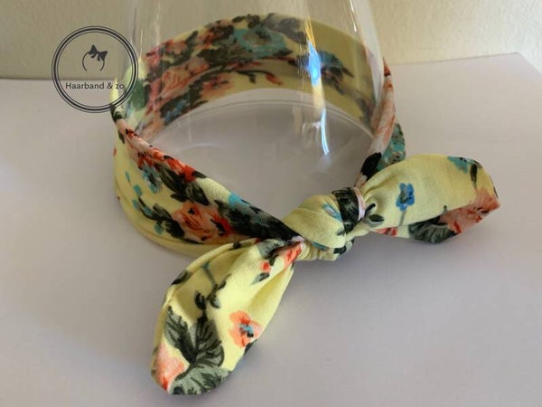 Elastische baby haarband met mooie bloemenprint, zachtgeel met roze rozen (art.nr. 117-03)