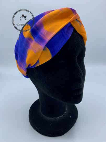 Haarband & zo, Haarband met twist met elastische band in oranje/blauwe print (art.nr. 129-02)