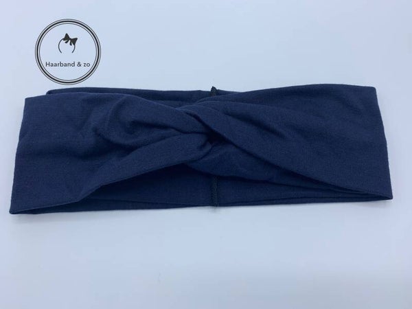 Elastische haarband van stevig tricot, met twist in de kleur donkerblauw (art.nr. 217-09)