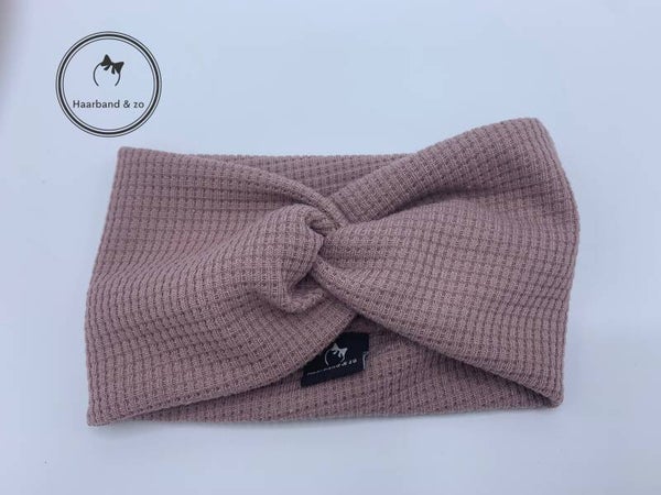 Haarband & zo, Elastische babyhaarband van wafeltricot, in oudroze met twist. (art.nr. 284-02)