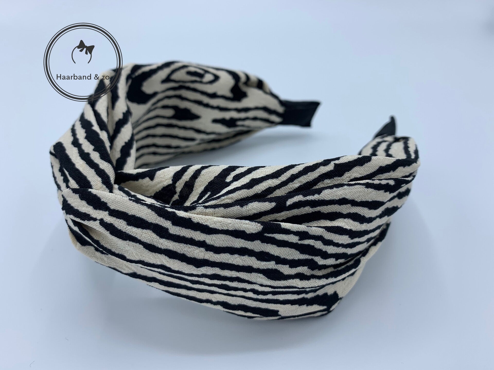 Haarband met twist in zebramotief, zwart/creme (art. nr. 157-09)