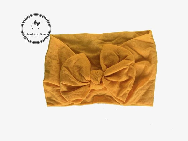 Nylon baby haarbandje met strik, geel (art nr. 96-06)