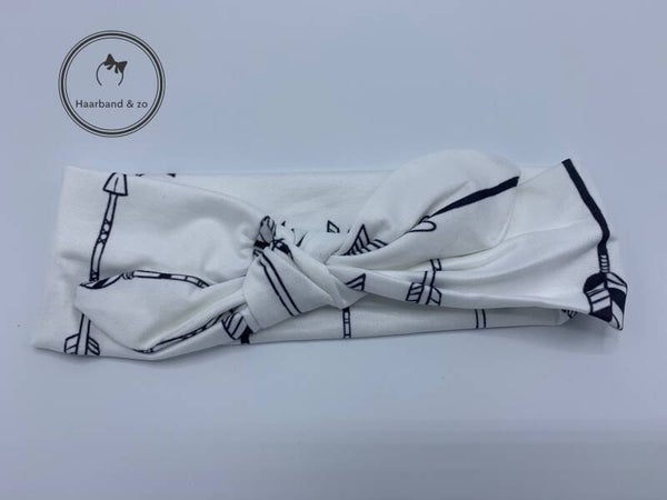 Elastische haarband voor baby's, glanzend, wit met zwarte print (art. 98-02)