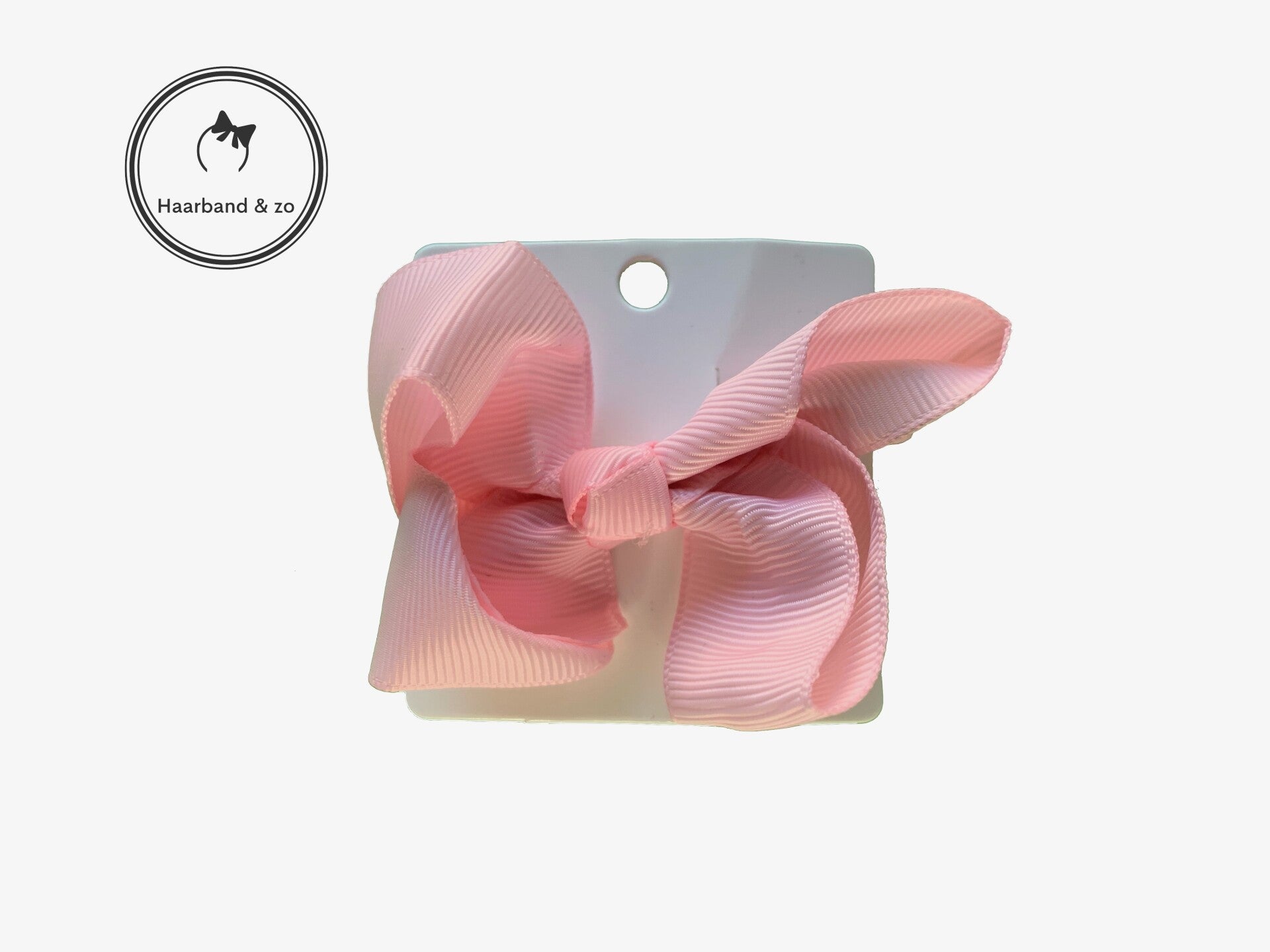 Haarstrik van lint op klemmetje, roze (art.nr. 95-01)