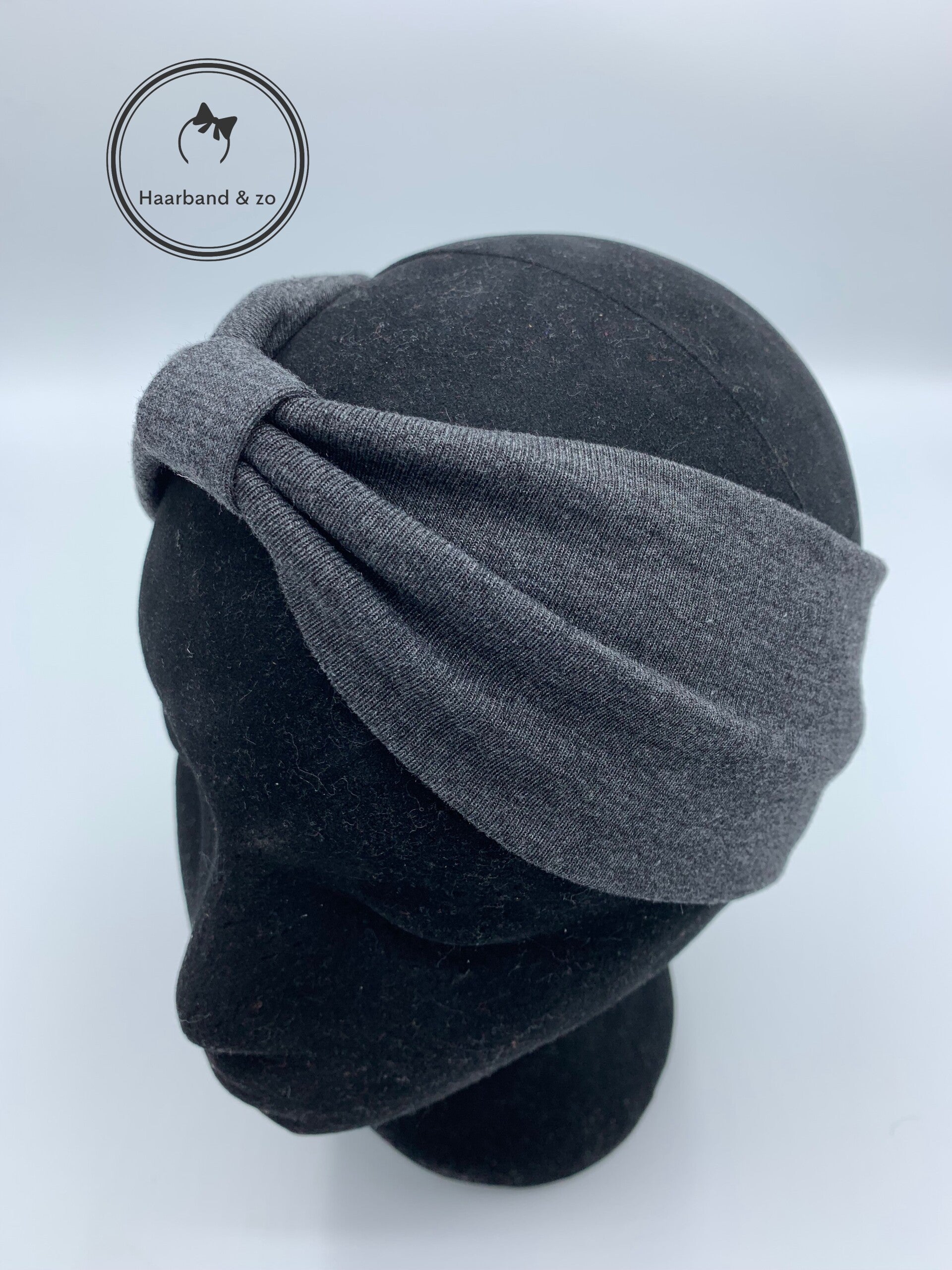 Elastische haarband met bandje, tricot, in de kleur gemêleerd antraciet. (art.nr. 221-07)