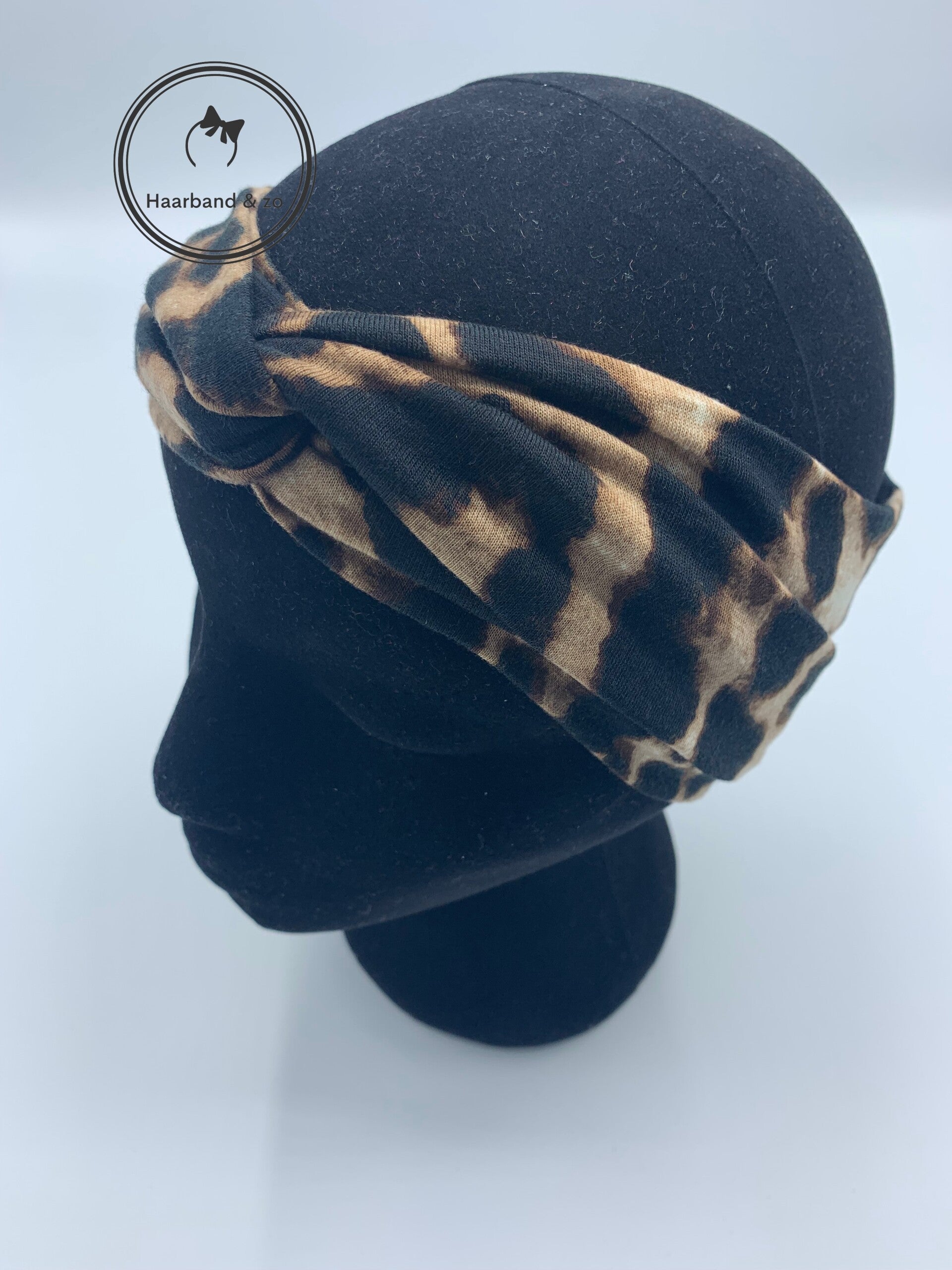 Elastische haarband in luipaard print in bruin/zwart (art.nr. 107-04)