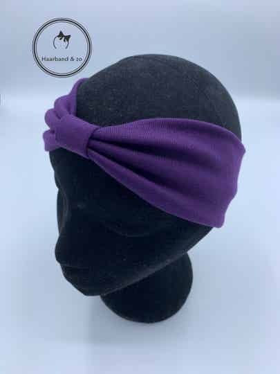 Elastische haarband met bandje, tricot, in de kleur paars. (art.nr. 221-03)