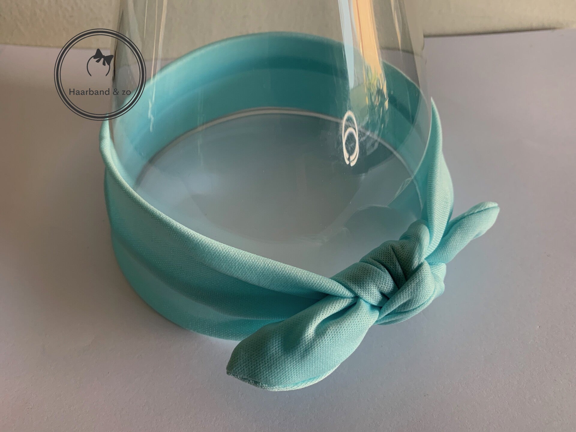 Basic elastische babyhaarband met strikje, mintgroen (art.nr. 116-01)