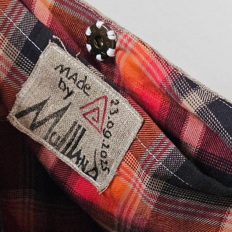 Handmade label tag made by Mullland with production date.
