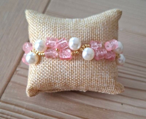 Armband met doorzichtig roze kraaltje
