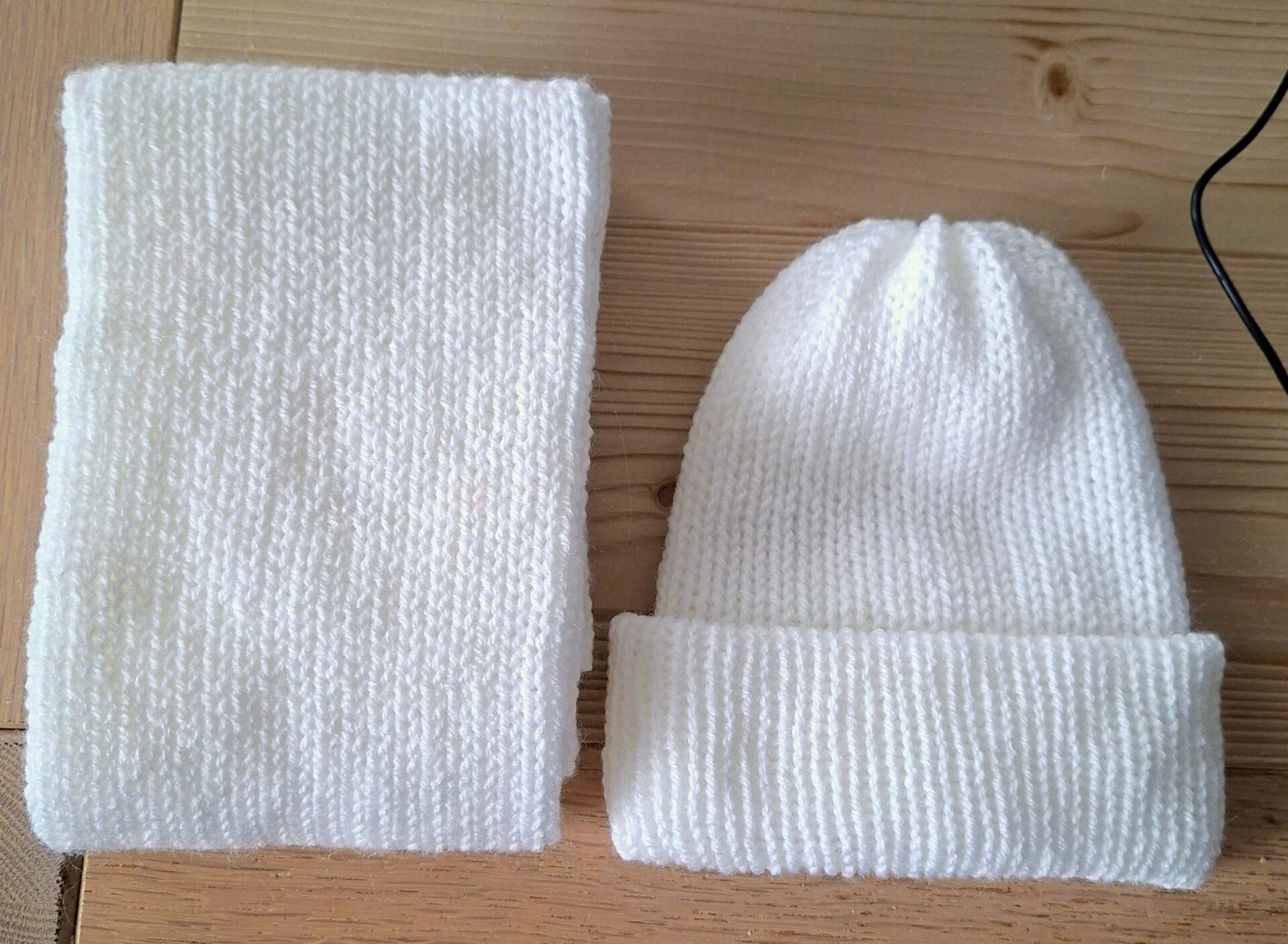 Witte set kindersjaal en muts