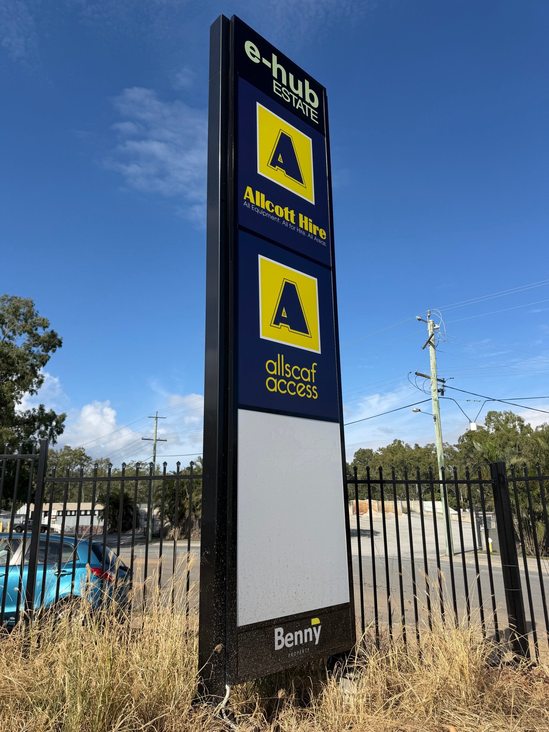 Multi-tenant pylon sign for Davadi Place and IGA, custom manufactured and installed by PSA in Brisbane.