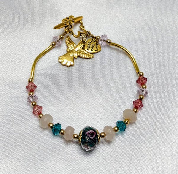 Bracelet - Centerpiece bead with curved spacers