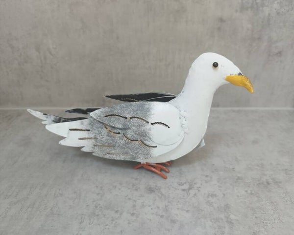 Fairtrade metalen Zeemeeuw. Zittend