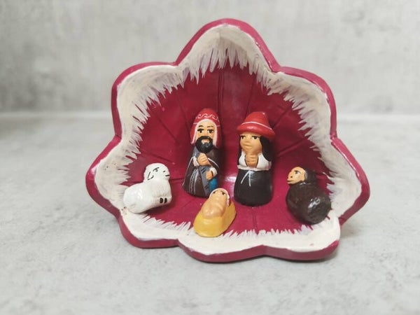 Kerstgroep in bloem rood.