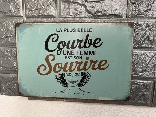 La plus belle courbe d’une femme et son sourire