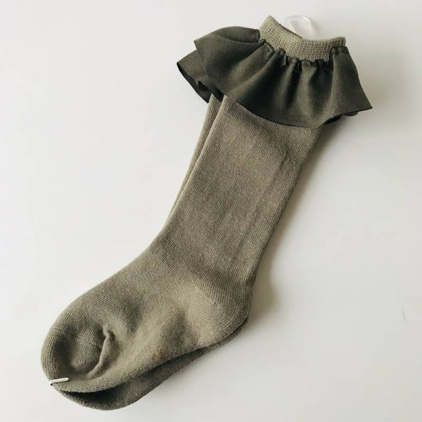 Kniekousjes met kraagje in kaki maat 1-3 jaar