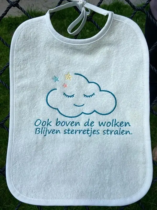 54. Slabbetje “Boven de wolken”