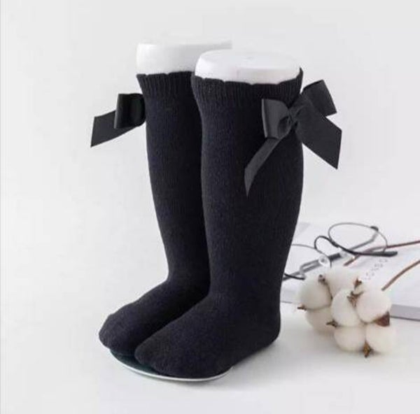Kniekousjes zwart met strik medium