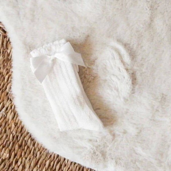 Kniekousen met motiefje en satijnen strik