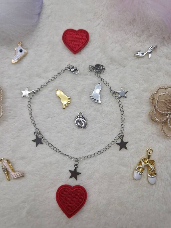 CHAINE DE CHEVILLE ETOILE EN ARGENT