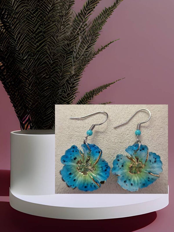 B.OREILLE FLEUR RESINE BLEU ARGENT