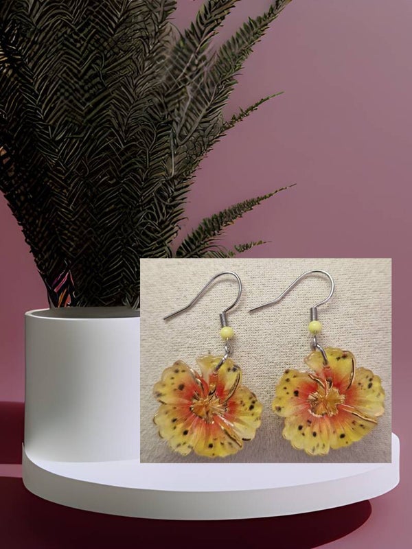 B.OREILLE FLEUR RESINE JAUNE ARGENT