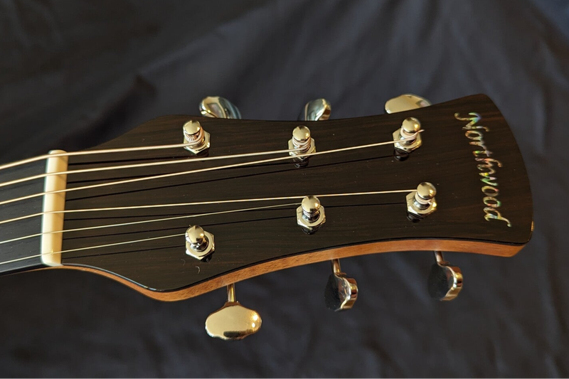 Northwood guitars 70 series paddle headstock with standard Grover 18:1 Sta-tite tuners and absalone Northwood logo.