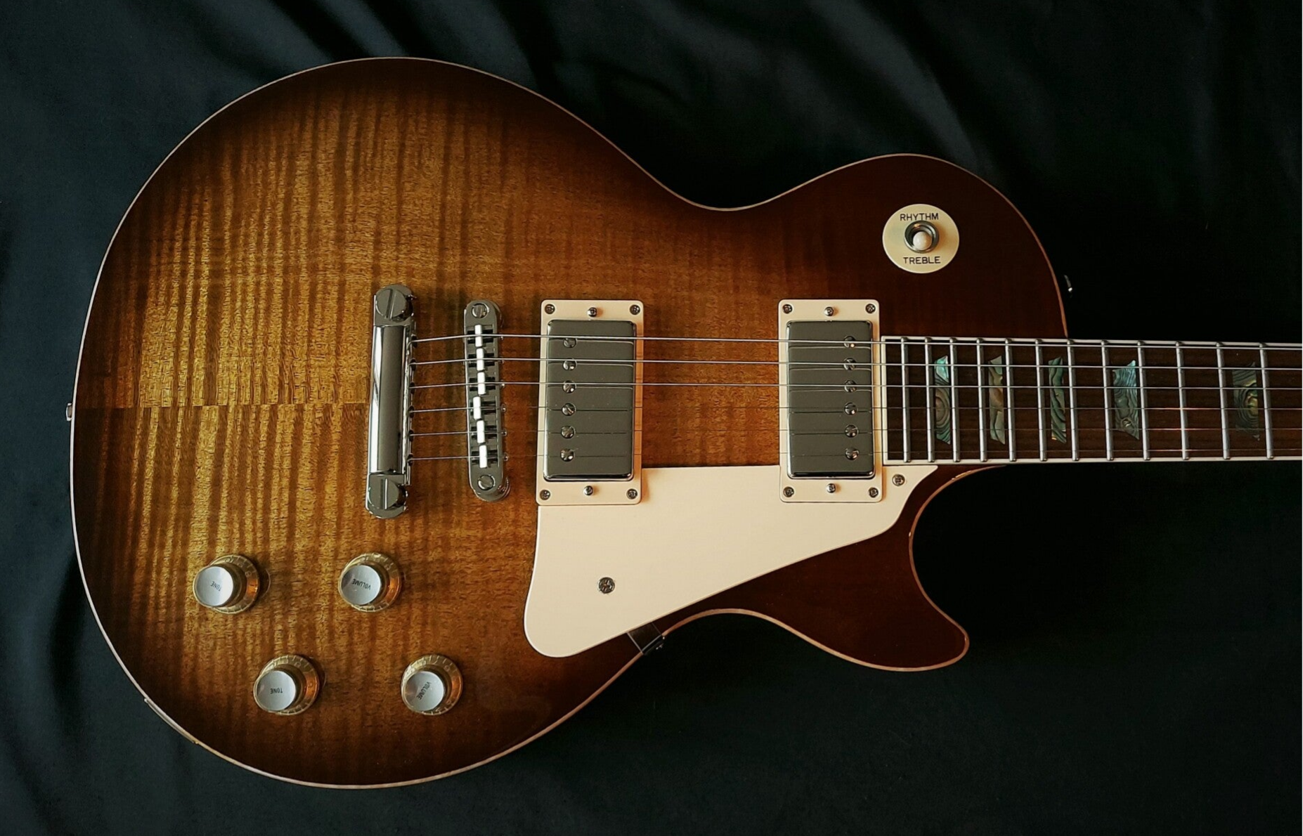 Northwood single-cut electric guitar with 5A Flamed Maple carve top, Rosewood Fretboard and Abalone trapezoid fretboard inlays