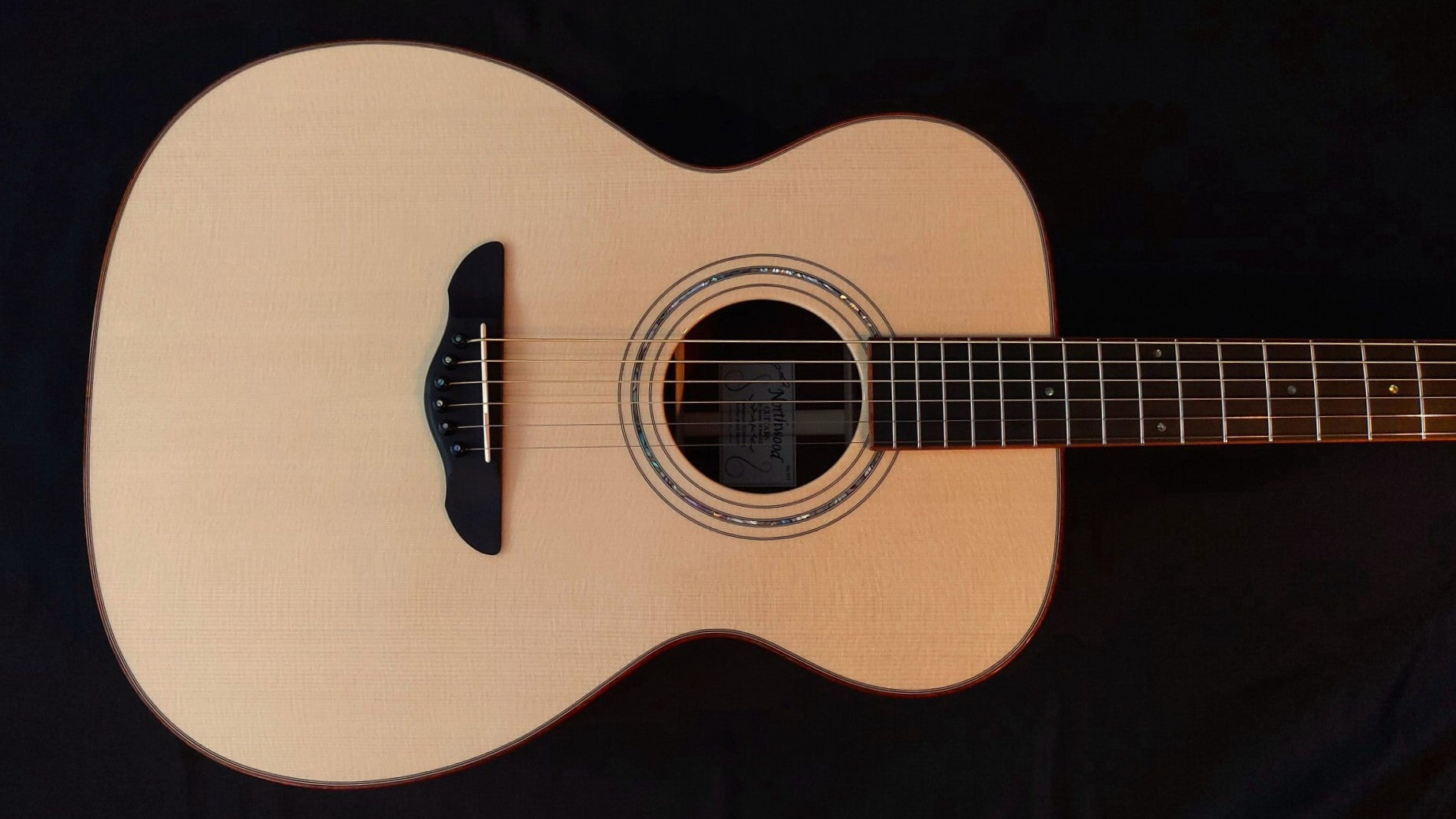 Northwood guitars Orchestra Model, similar shape as 14 fret 000, acoustic guitar model with spruce top and abalone rosette.
